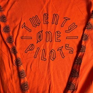 Orange twenty one pilots long sleeve t shirt.